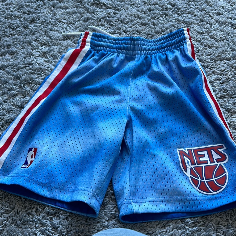 In great condition Mitchell and Ness Nets basketball shorts
